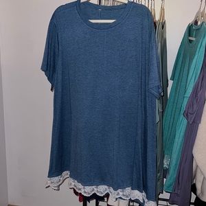 Top purchased from Amazon. Lace hem detail. Size 5X.